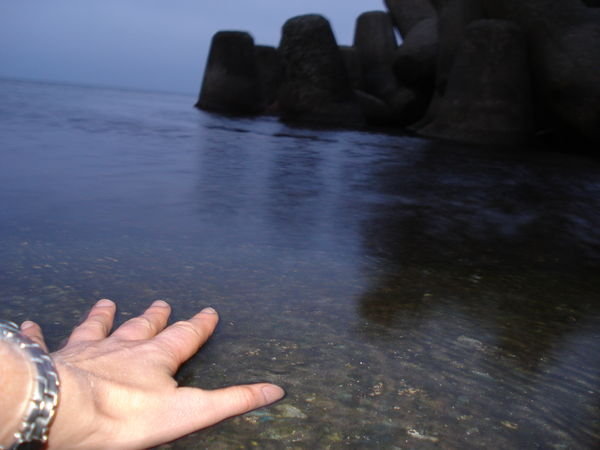 touching the nippon kai as it meets the ohskohsk sea