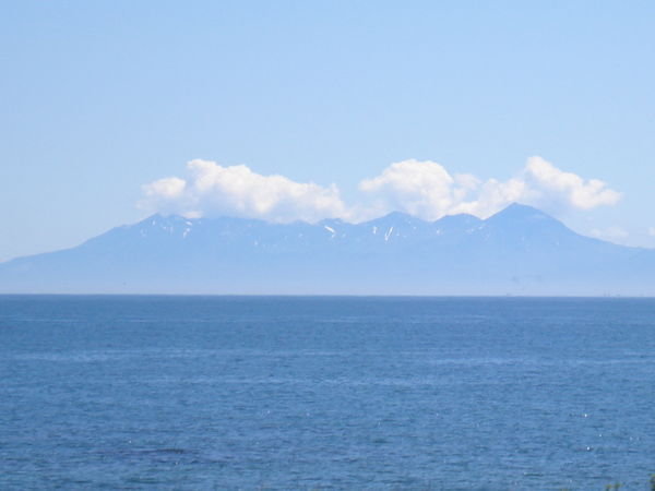 A snowy Shiretoko peninsula in the distance