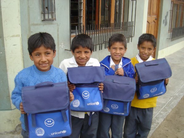 Kids with UNICEF backpacks HODR helped pack