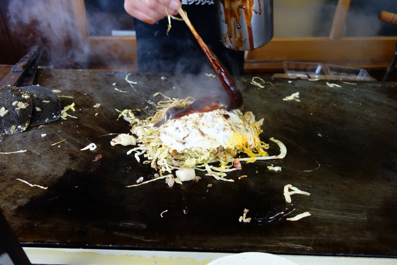 Sauce goes into Okonomiyaki