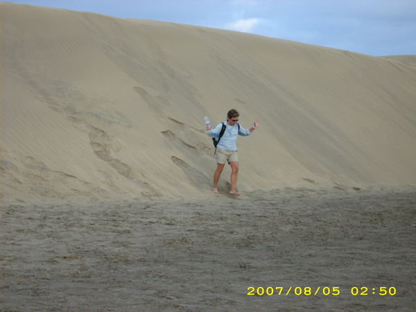 Julie headed down the dunes