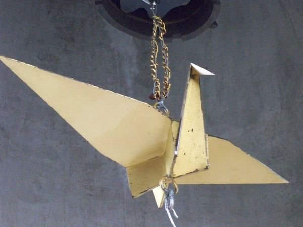 gold-coloured "folded" crane