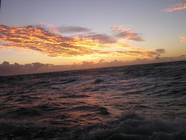 Sunrise over troubled seas