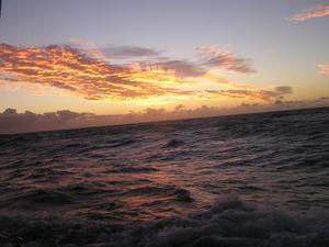 Sunrise over troubled seas