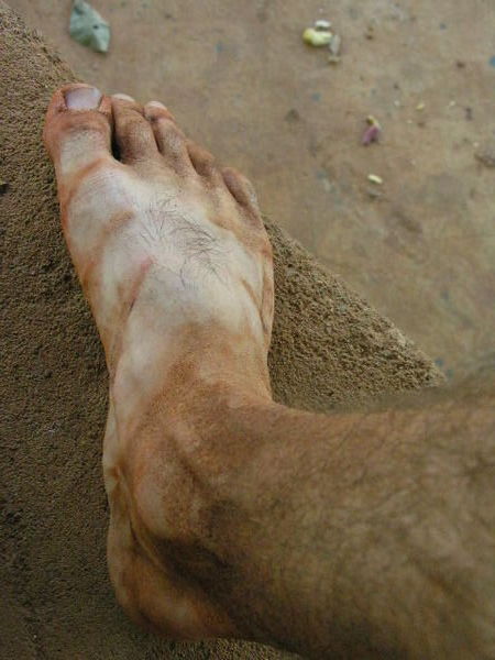 My foot after it tramped some dirt roads