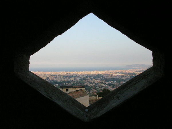A look out a peep hole from the Duomo of Palermo below