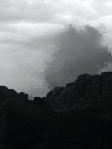 ocean crashing against rocks(b&w)2