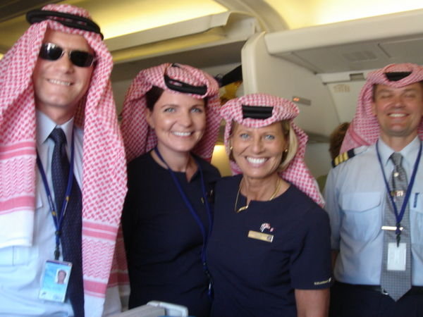 Our airline crew dresssing up as we leave Dubai for Nairobi