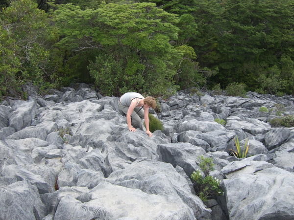 Sal clambering over limestone 'karst' landscape