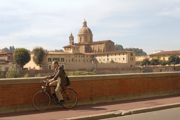 Man in Suite Looking along the Arno