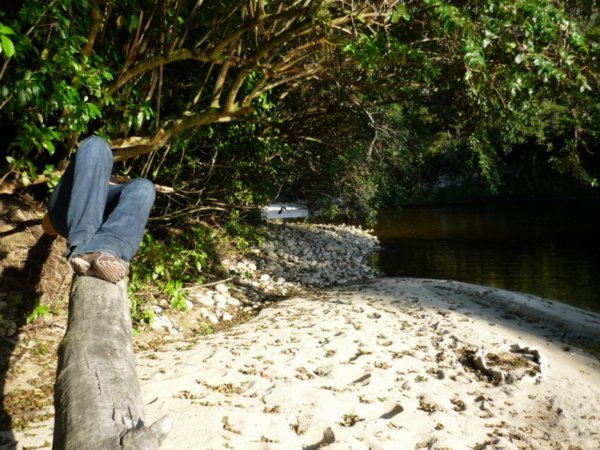 Relaxing on the hidden river-beach