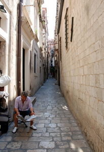 Reading the paper in Dubrovnik