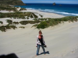 Sophie trying to climb the dune at sandfly bay