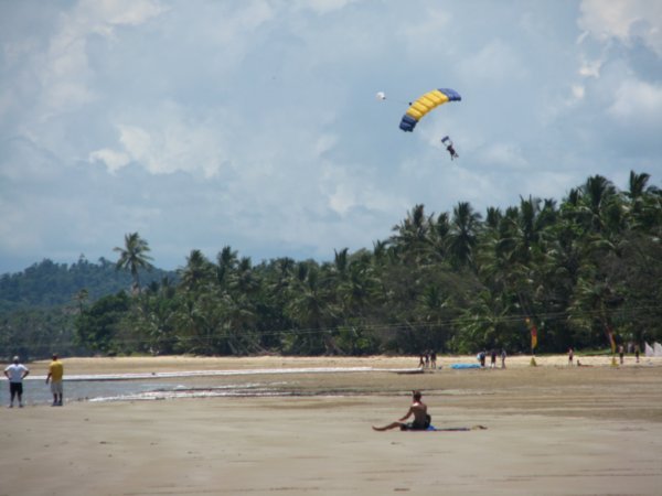 Skydivers landing on Mission Beach