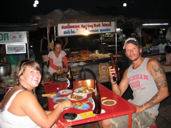 Zoe & Dale enjoying night market hawker food