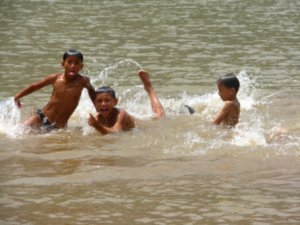 Kids playing in the river