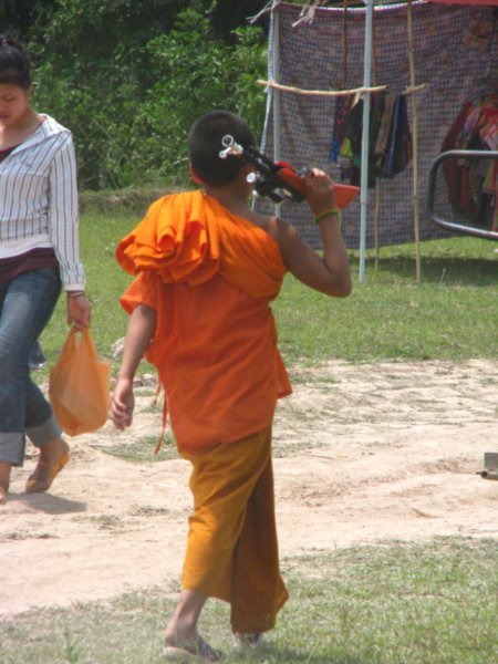 Gun toting monk