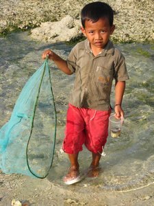 Boy fishing on Gili Air