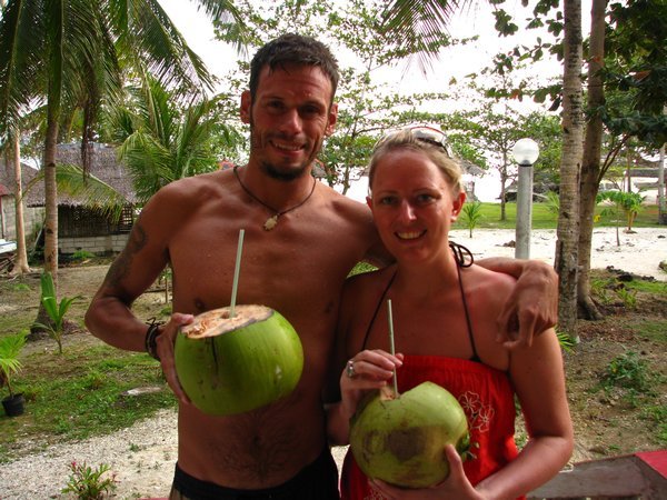 Dale & El enjoying a lovely bunch of coconuts
