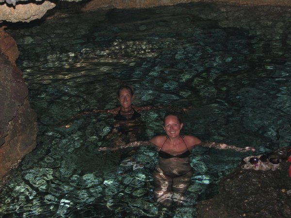 Sophie & El swimming in the cave at Anda