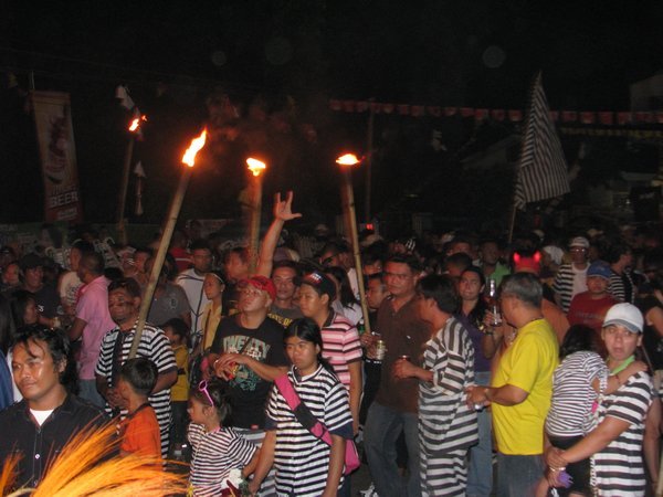 Torches in the night parade