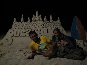 Us by one of the sandcastles