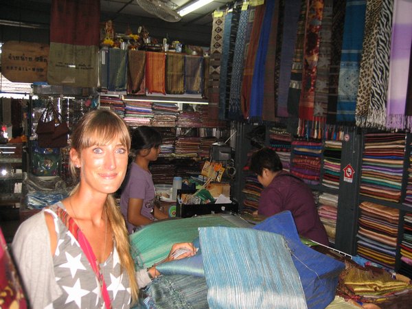 Sophie buying silk at the Chatuchak market