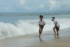 Playing in the surf on Kuta Beach