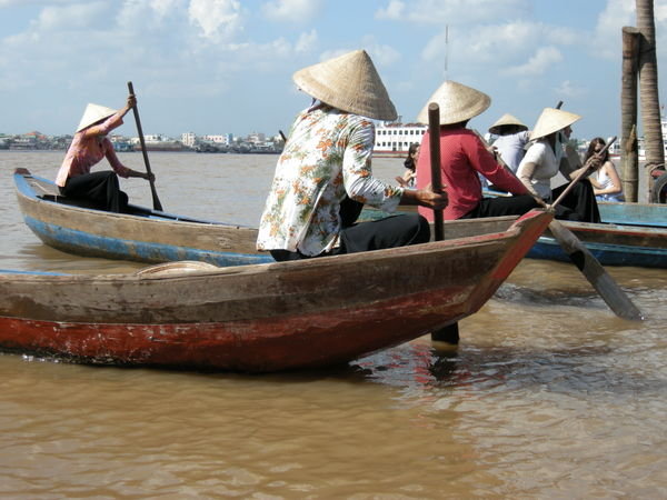 Boat People on the Mekong Delta