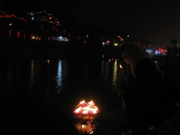 Boat Gently floating in the Tuo River, bringing our wishes with it..