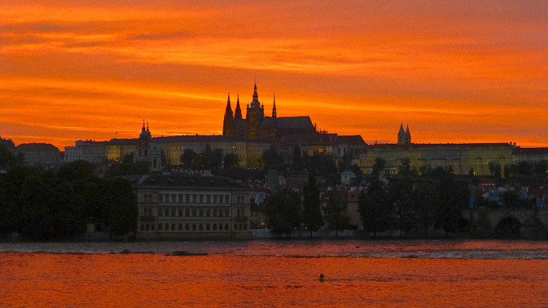 Beautiful sunset on Vltava and Prague Castle