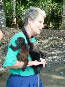 Carol with baby howlers at Osa Wildlife Sanctuary