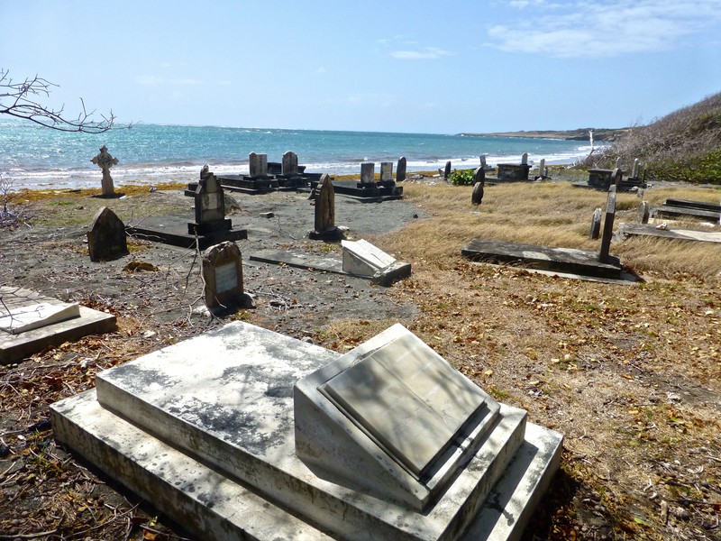 Graveyard going into the sea in Carriacou