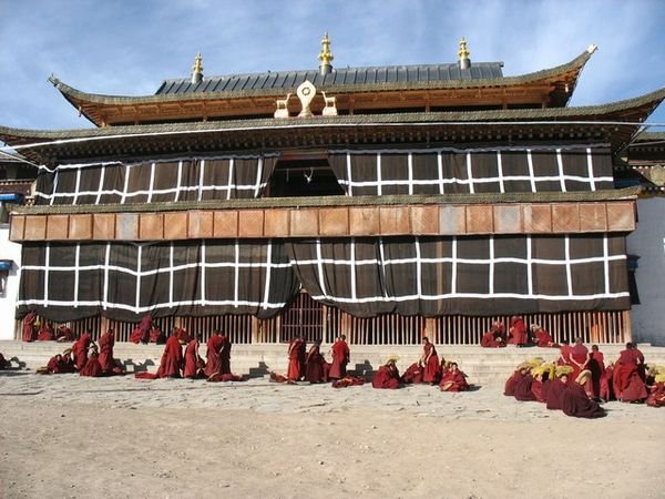 Monks gathering to argue