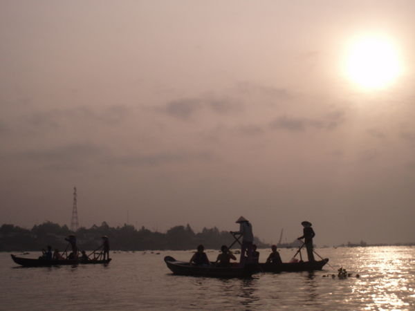 Boats in sunrise
