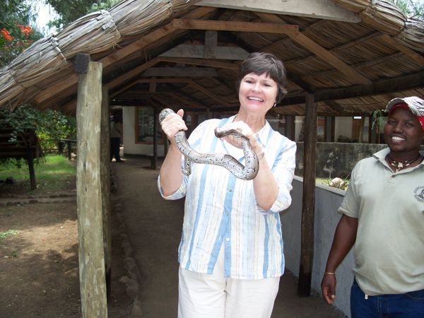 Linda plays with a python
