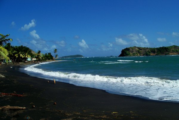 Volcanic black sand beach on the island of Grenada | Photo