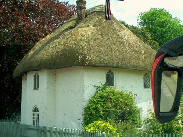Typical thatch-roofed house in the Cotswolds