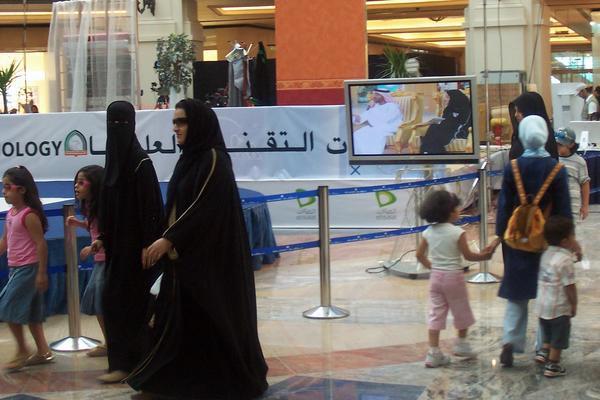 Shopping at the Mall of the Emirates...under those black robes are designer fashions.