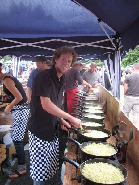 Me preparing some roesti(swiss potato dish). we started making it @ 6.30am and were sold out @ 3 pm. all in all 600kg of potato, makes 2500 portions x 3$=