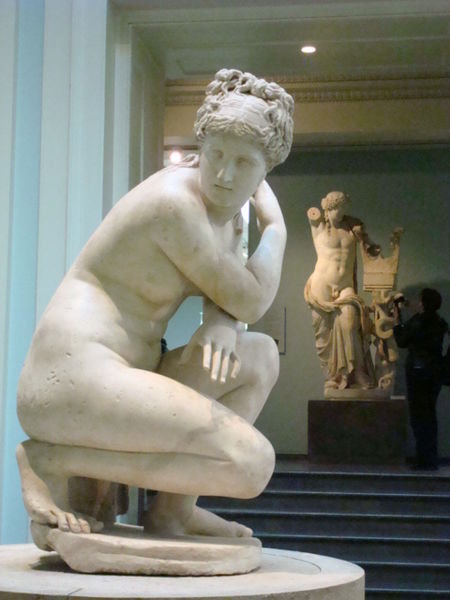 crouching Aphrodite bathing