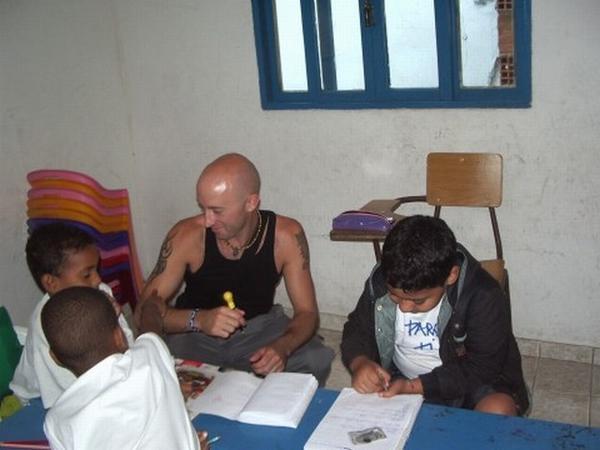 Andy in a school in a favela