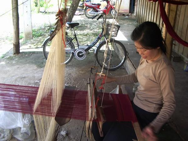 A local woman weaving her magic.