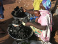 Sanatu (Charcoal Seller with Baby)