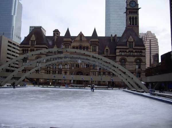 The Ice rink and city hall by day