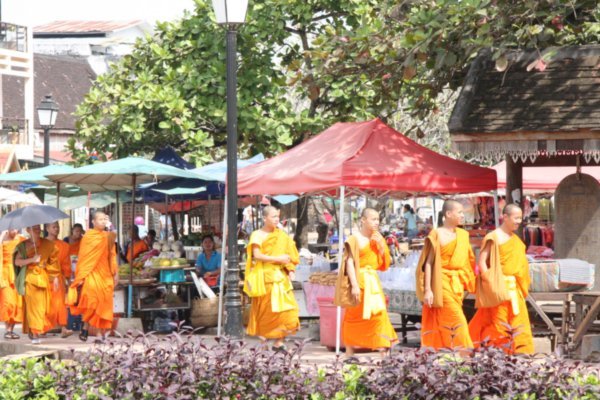 Monks  in front of the Hmong market, Luang Prabang