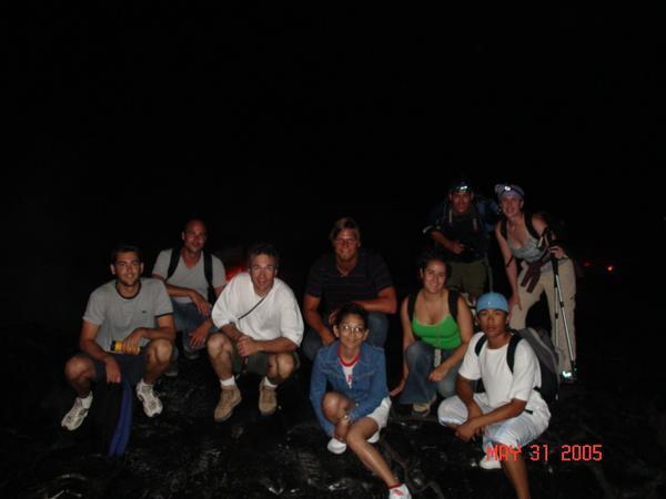 What remains of the volcano tour group, walking back at night