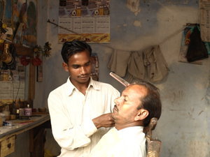 Guy getting a shave