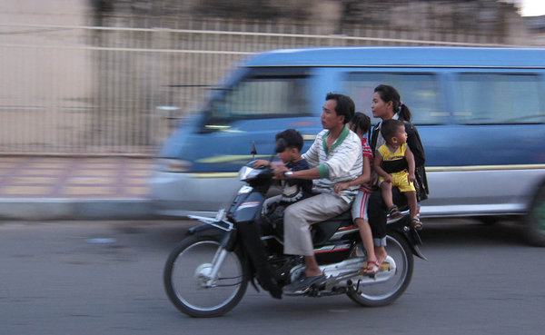 Typical family on a motor bike