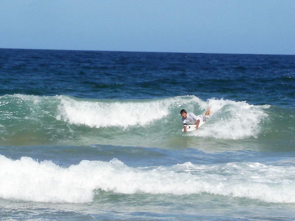 Evan riding a wave